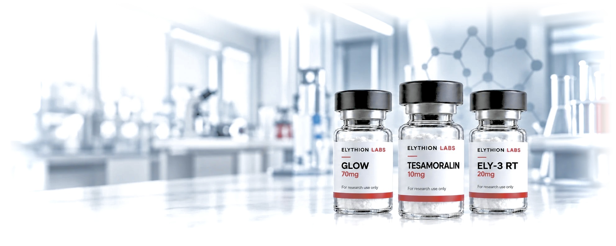 Three ELYTHION LABS research vials on a bright laboratory workbench